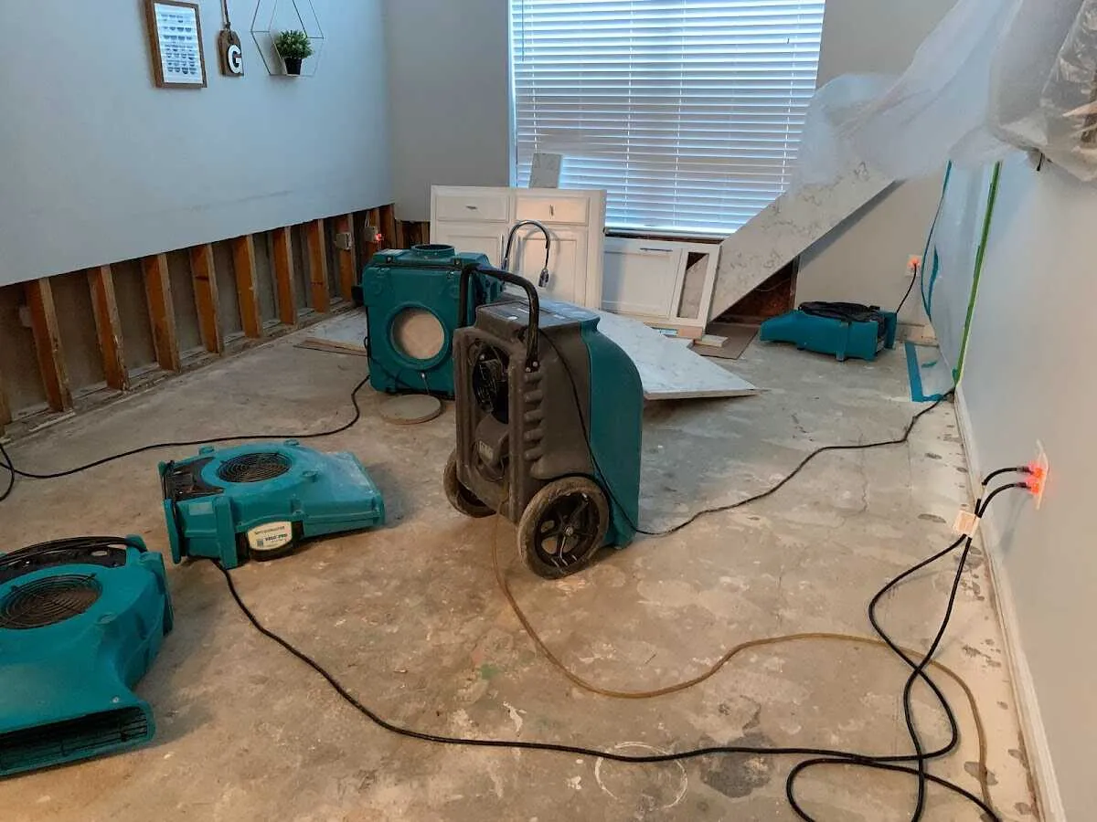 Dehumidifier in flood-cut room for Water Damage Restoration in Kearns